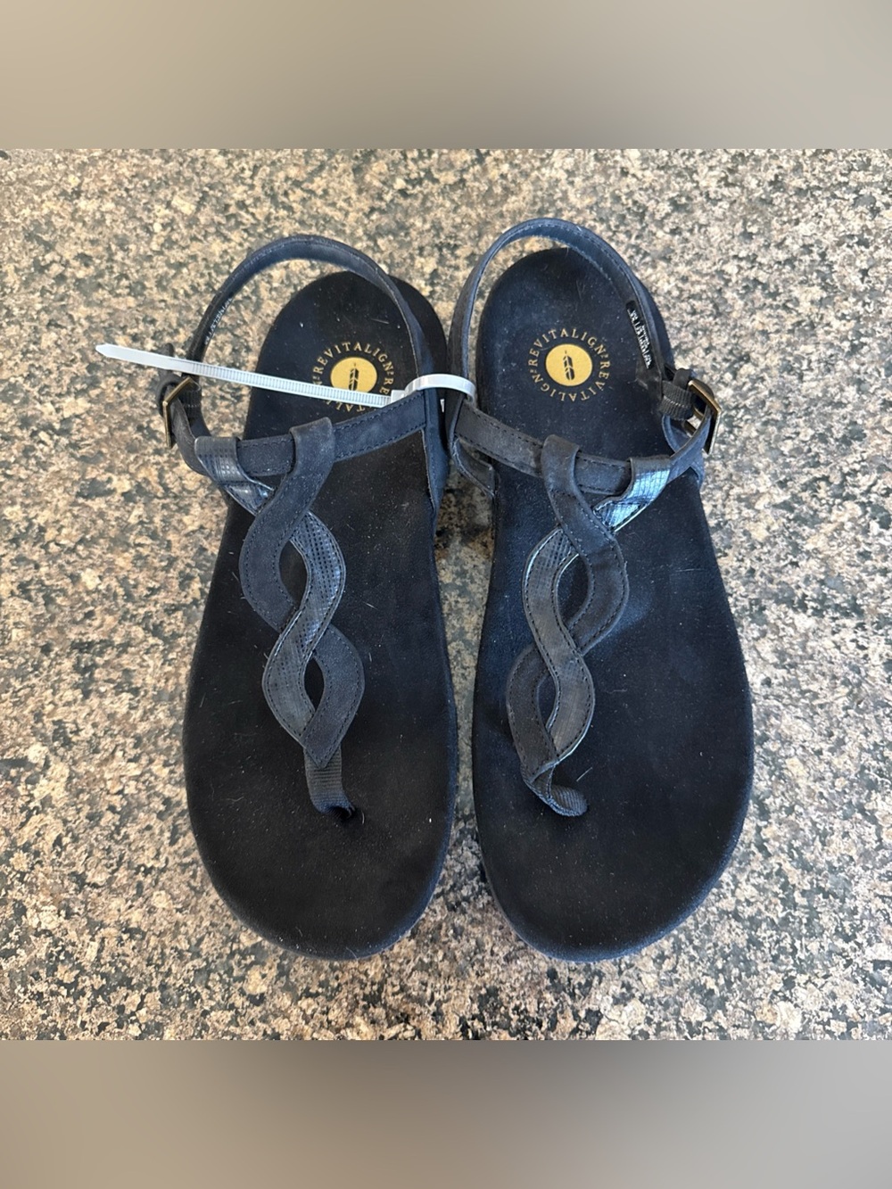 Revitalign Heron Black Leather Twist T-Strap Sandals